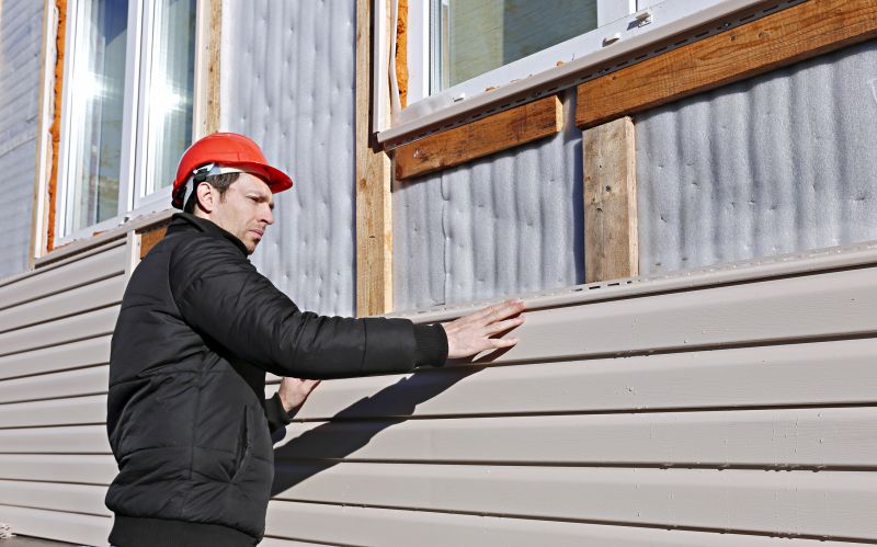 Professional Siding Installer on Site